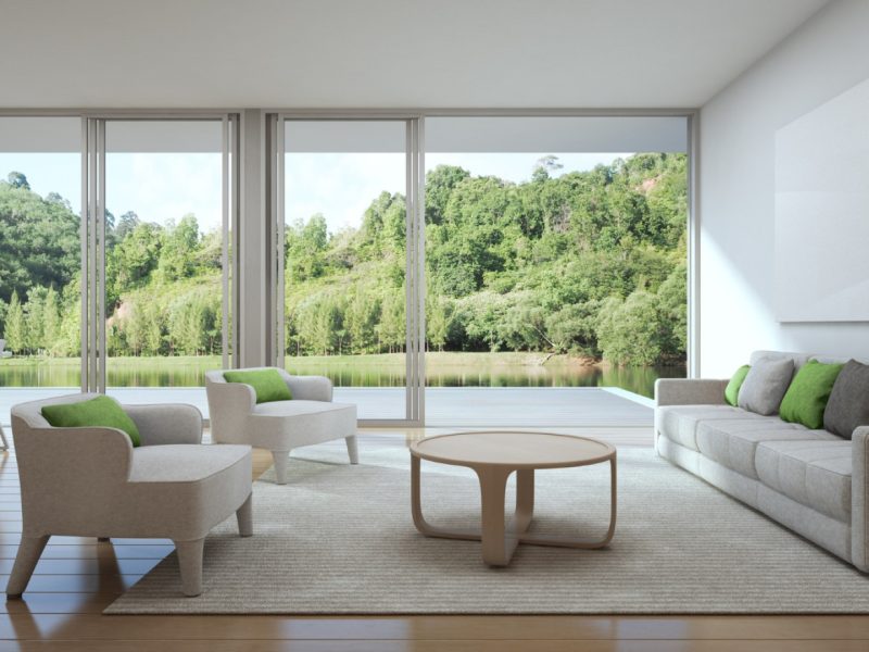Baies vitrées panoramiques : transformer votre pièce de vie avec lumière naturelle